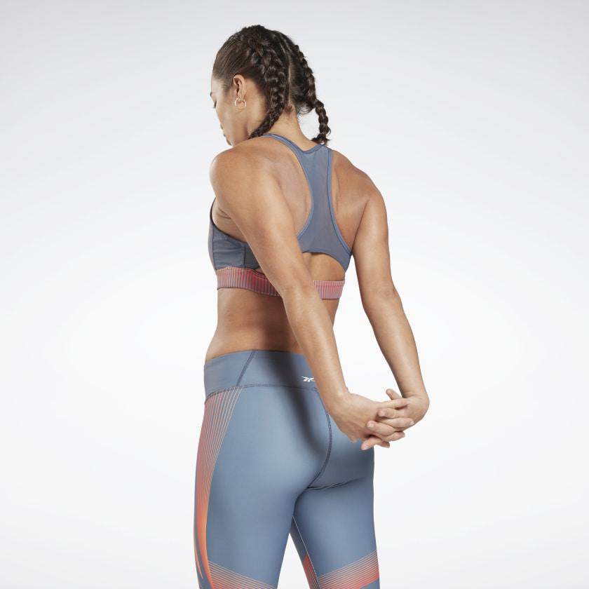 טופ ריבוק לנשים Reebok SH Hero Racer Bra AOP FT0743 smoky indigo - RunOFF עכשיו במבצע ב