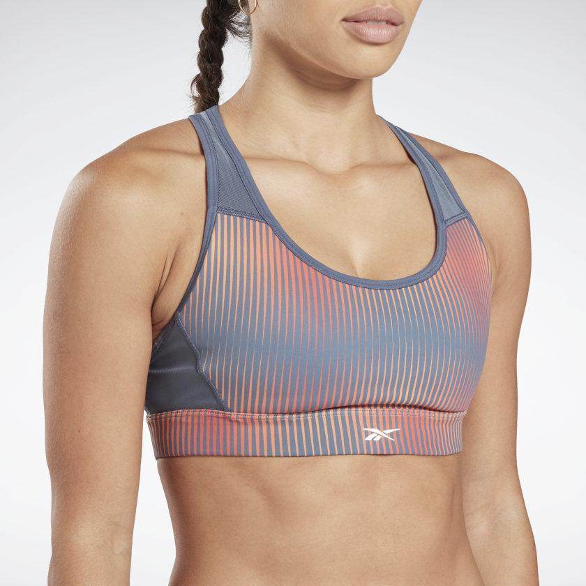 טופ ריבוק לנשים Reebok SH Hero Racer Bra AOP FT0743 smoky indigo - RunOFF עכשיו במבצע ב